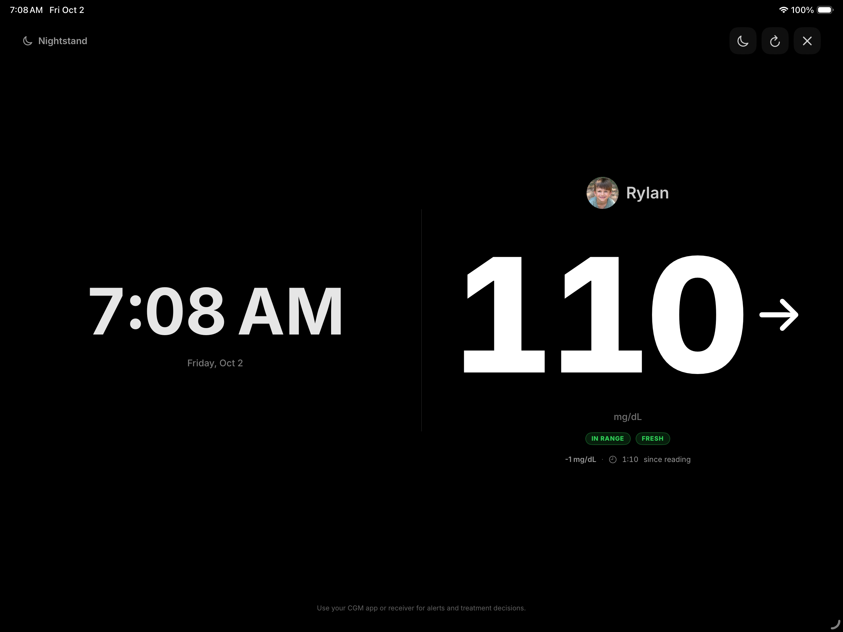 Mirror Health Nightstand Mode on iPad showing the time, a large glucose reading, trend arrow, and freshness